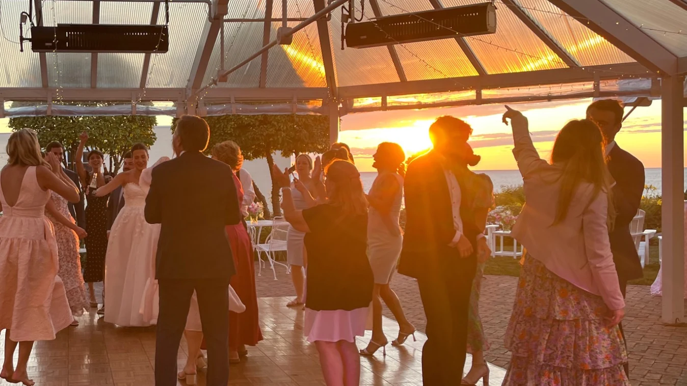 Sunset dance floor at a Michigan wedding reception with live music