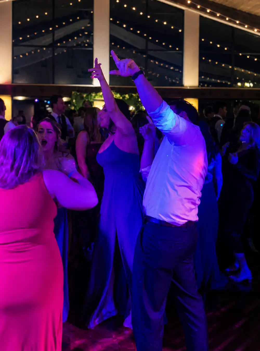 Guests dancing at Erin and Spencer’s Paint Creek Country Club wedding reception