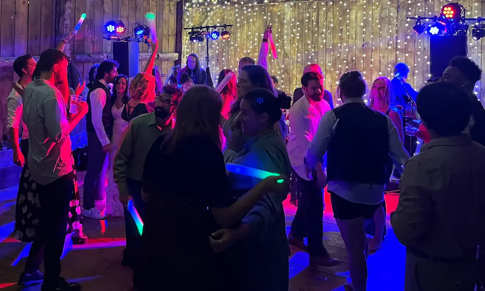 Packed dance floor at Vale Royal Barn wedding with Weekend ComeBack performing live