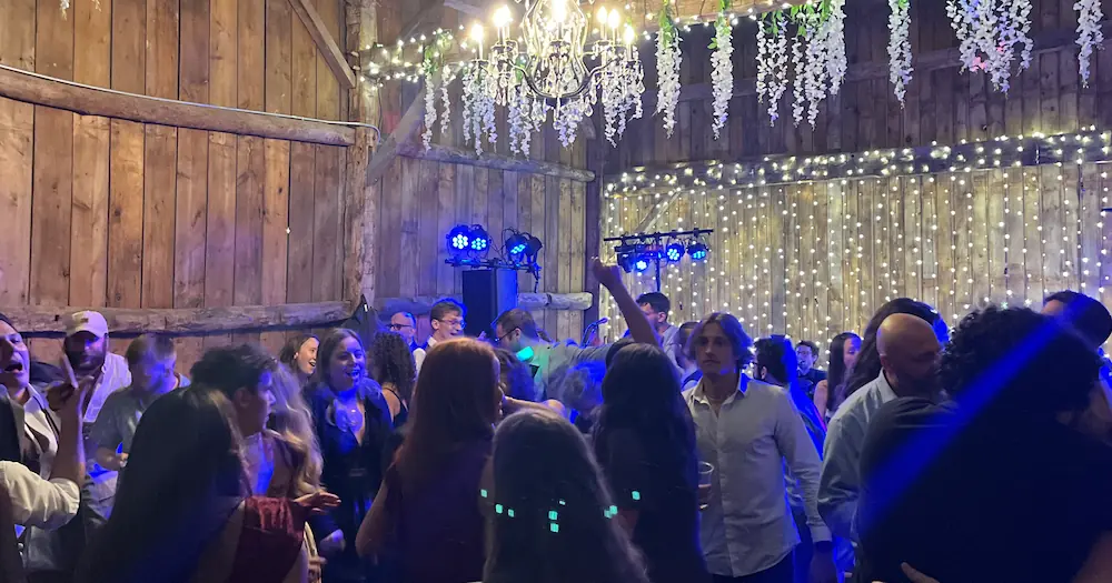 Packed dance floor during Michigan wedding reception