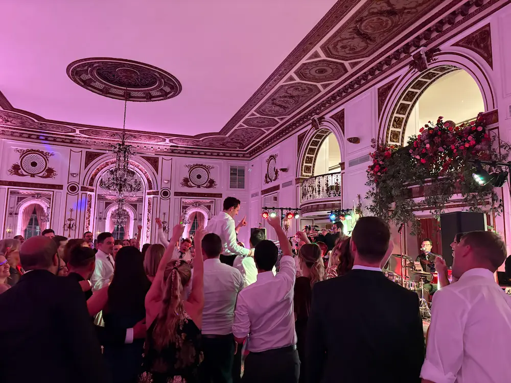 Crowd-level dance floor moment at Jared and Jess’s Colony Club wedding in Detroit