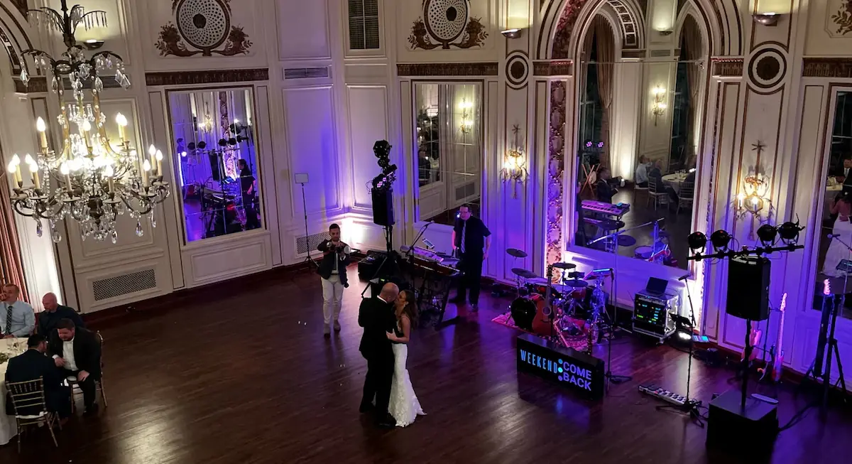 Wedding moment at Colony Club Detroit with Weekend ComeBack performing live