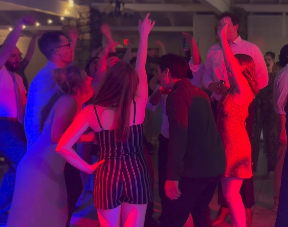 Wedding guests dancing at a Michigan reception during a Weekend ComeBack live performance