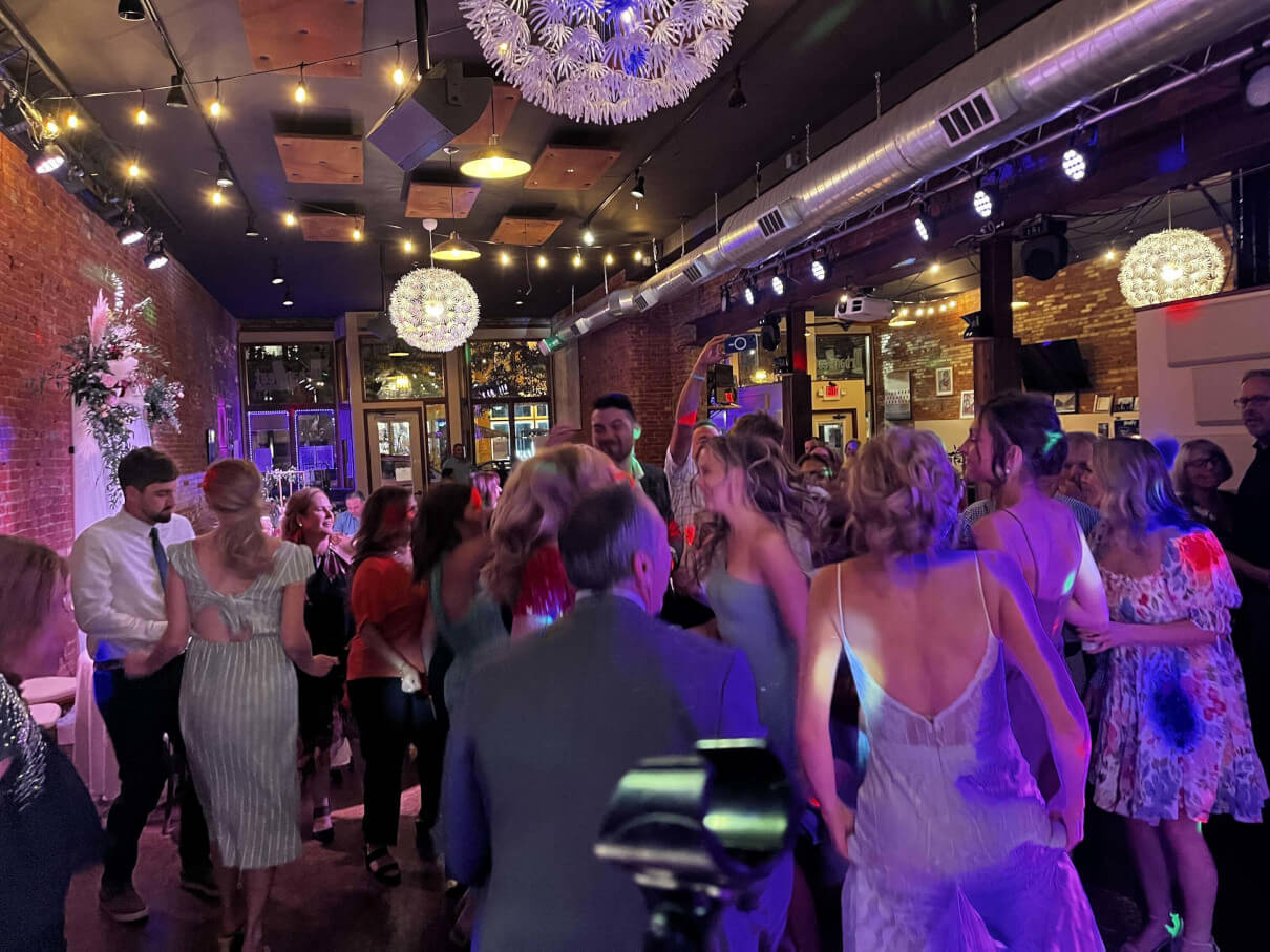 Packed dance floor at Urban Beat Lansing during a Weekend ComeBack wedding reception