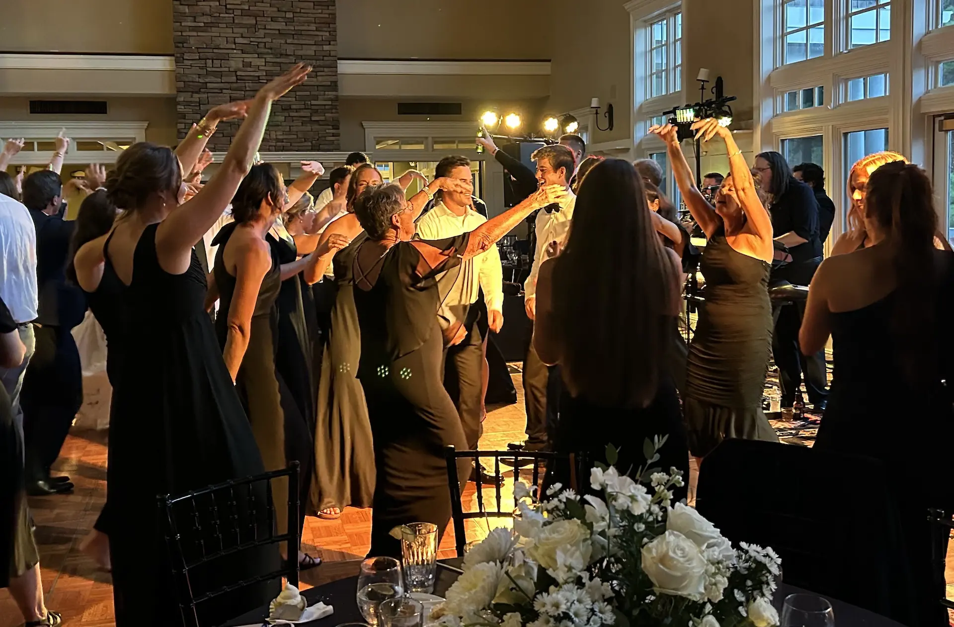 Full wedding dance floor during a Weekend ComeBack performance